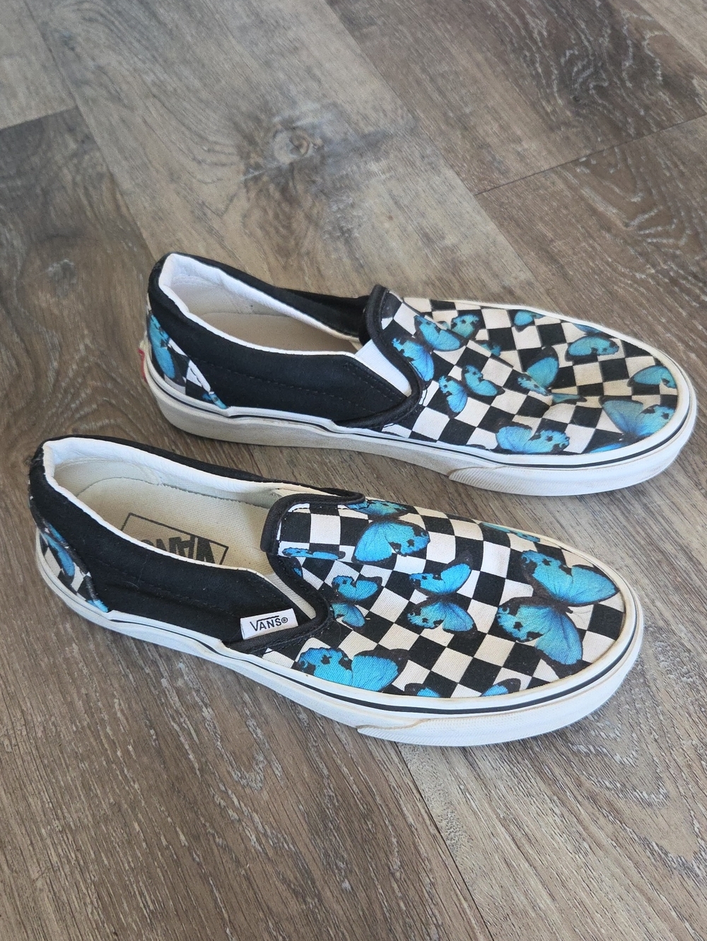 Vans Slip-On Sneakers in Black & Blue Butterfly Check